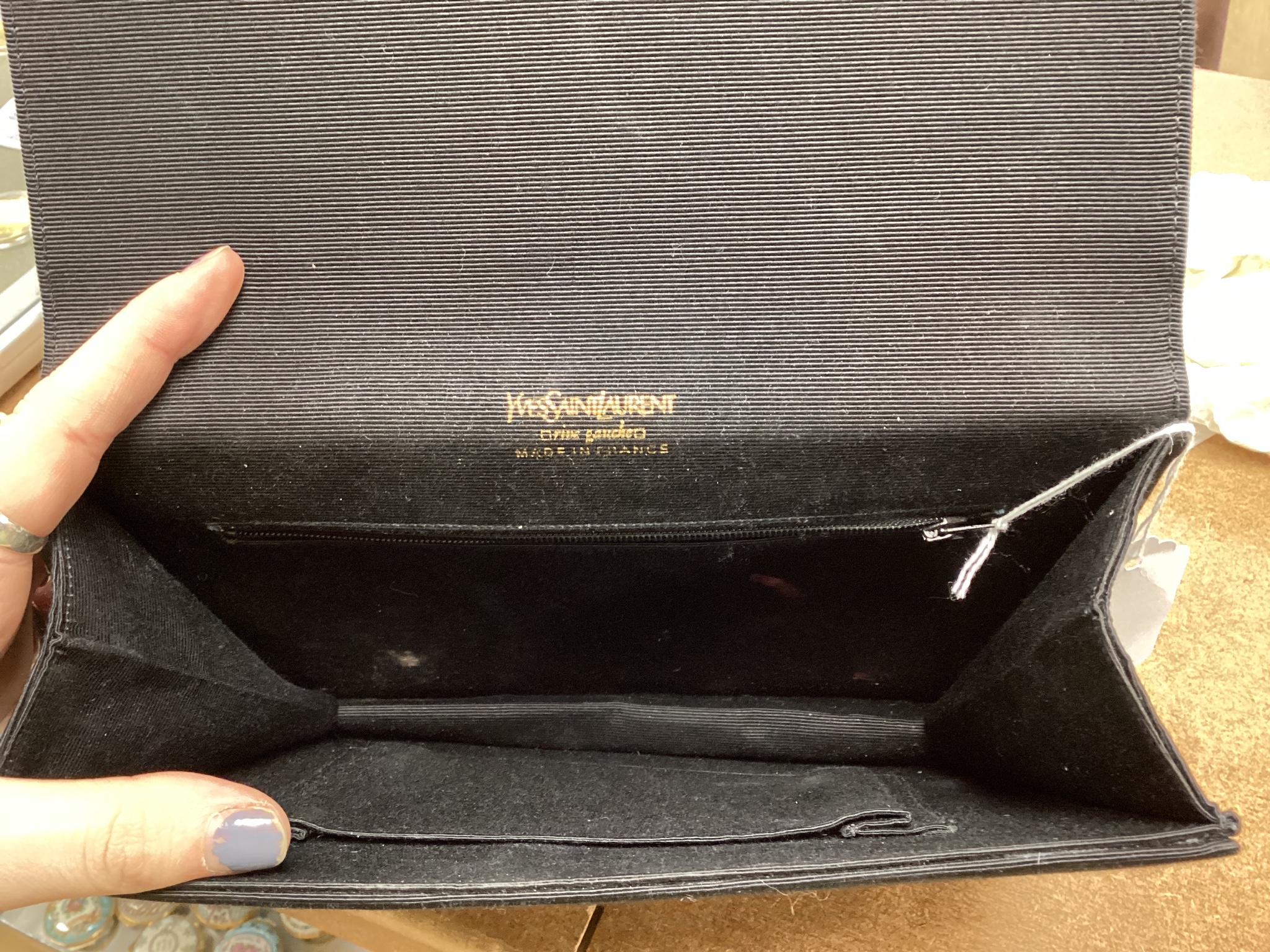 A vintage Yves Saint Laurent black silk satin clutch bag 25 cm.